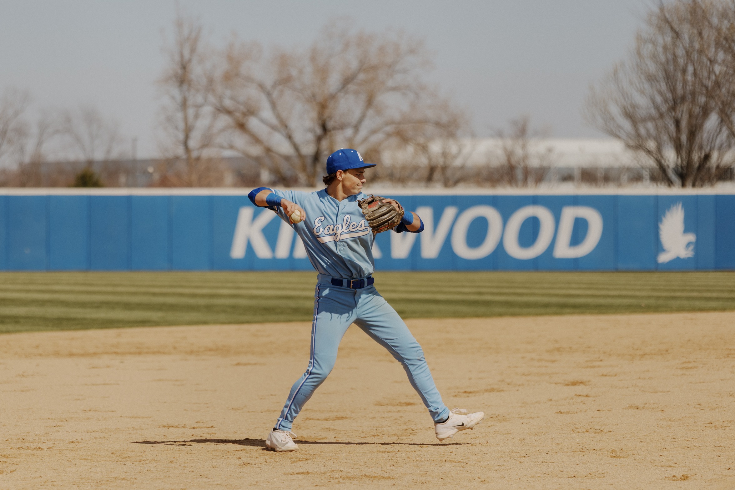 Baseball player about to throw the ball. 