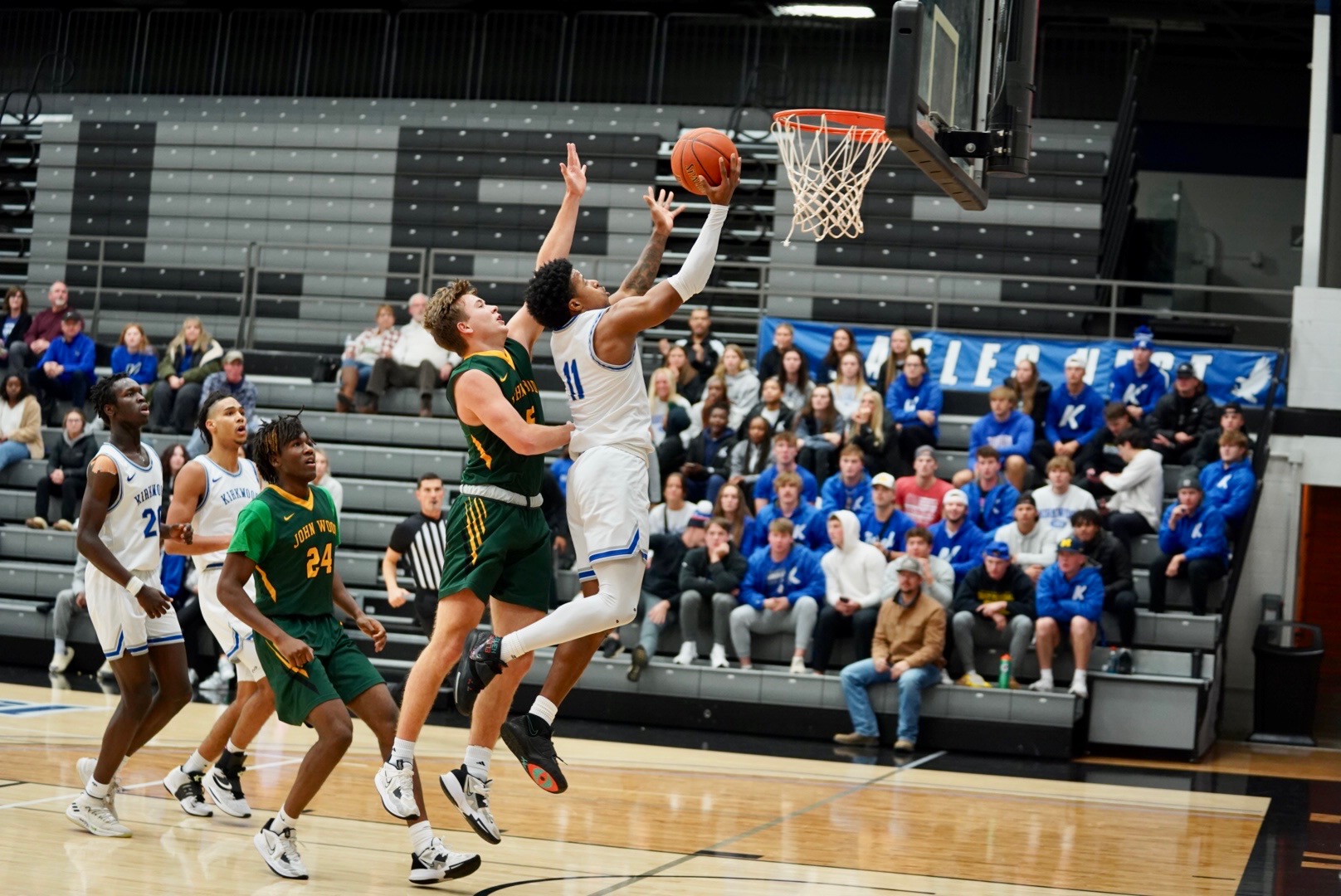 NO.8 KCC MEN CHOP DOWN JOHN WOOD